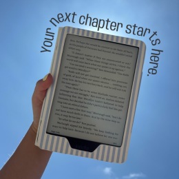 a hand holding a tablet