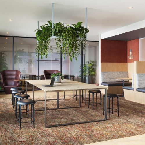 a room with a table chairs and private booths at The Views at Angle Lake